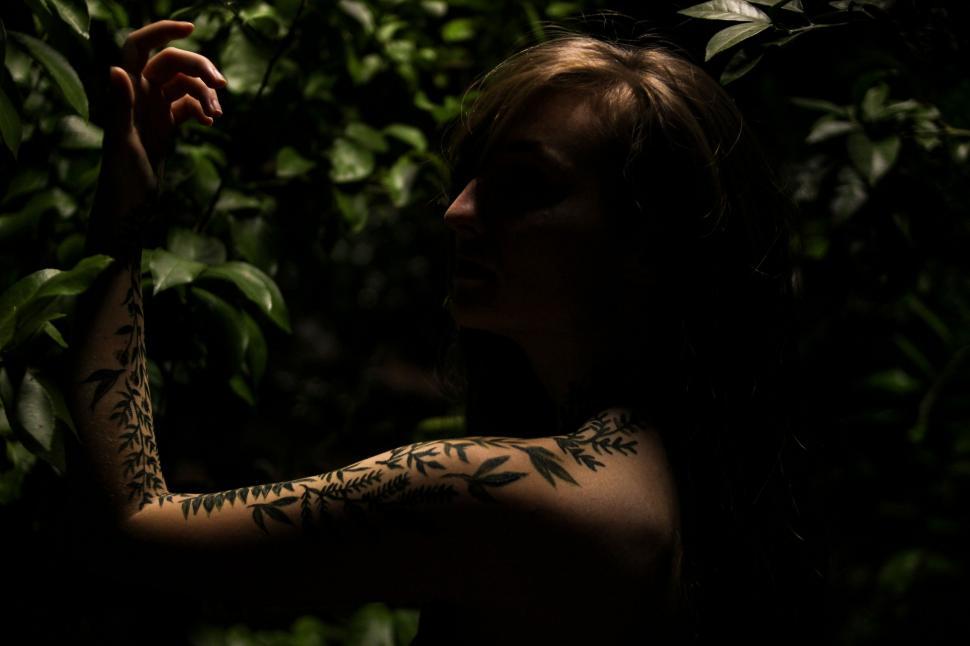 Free Image of Woman With Tattoo on Her Arm 
