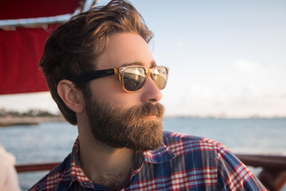 Free Image of Man With Beard and Glasses on a Boat 