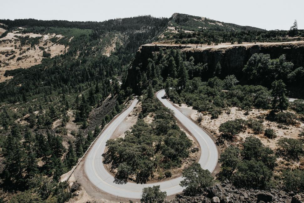 Free Image of Aerial View of Winding Road in the Mountains 