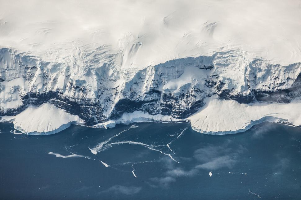 Free Image of Aerial View of Snow Covered Mountain Range 