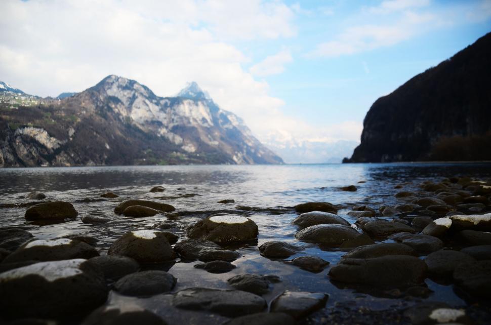 Free Image of Mountainous Water Body Surrounding Rocks 
