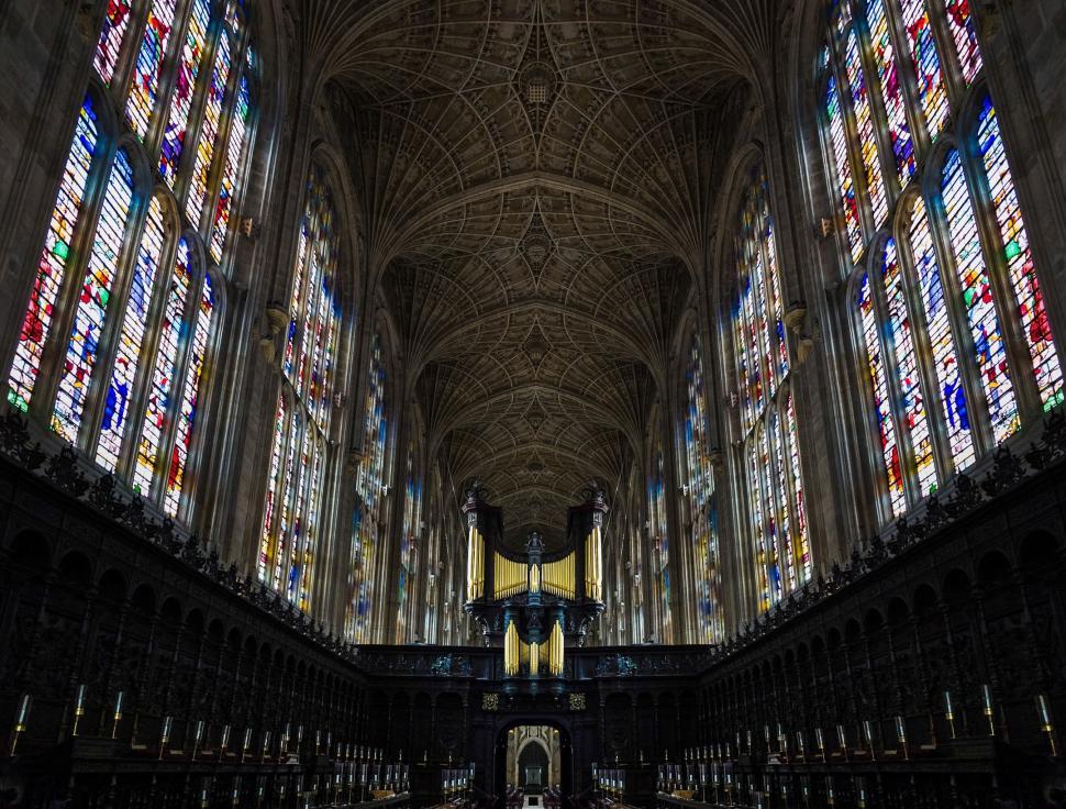 Free Image of Inside the Grand Cathedral With Stained Glass Windows 