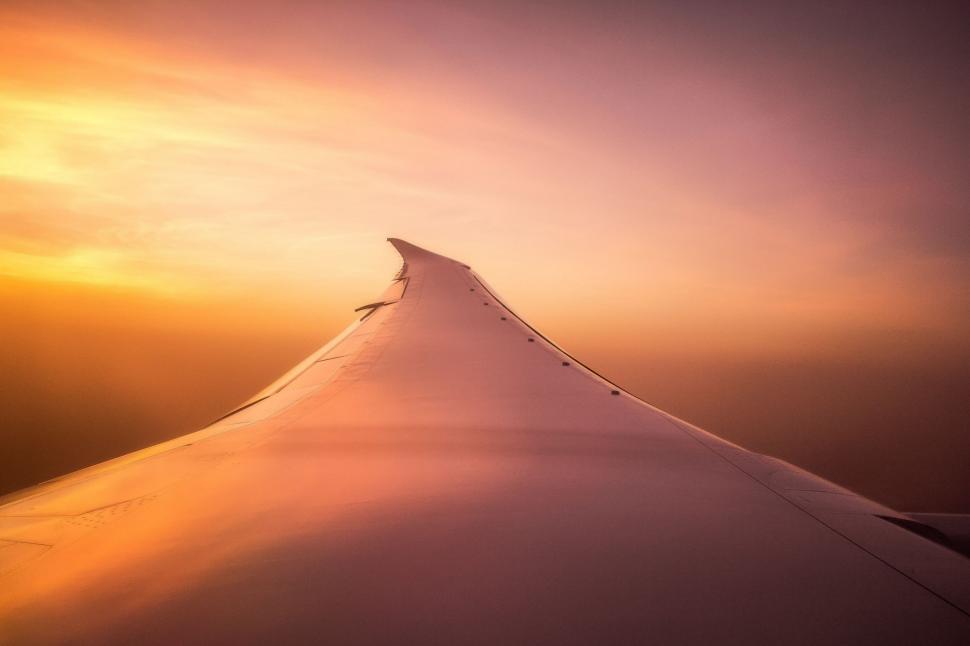 Free Image of Wing of an Airplane Flying in the Sky 