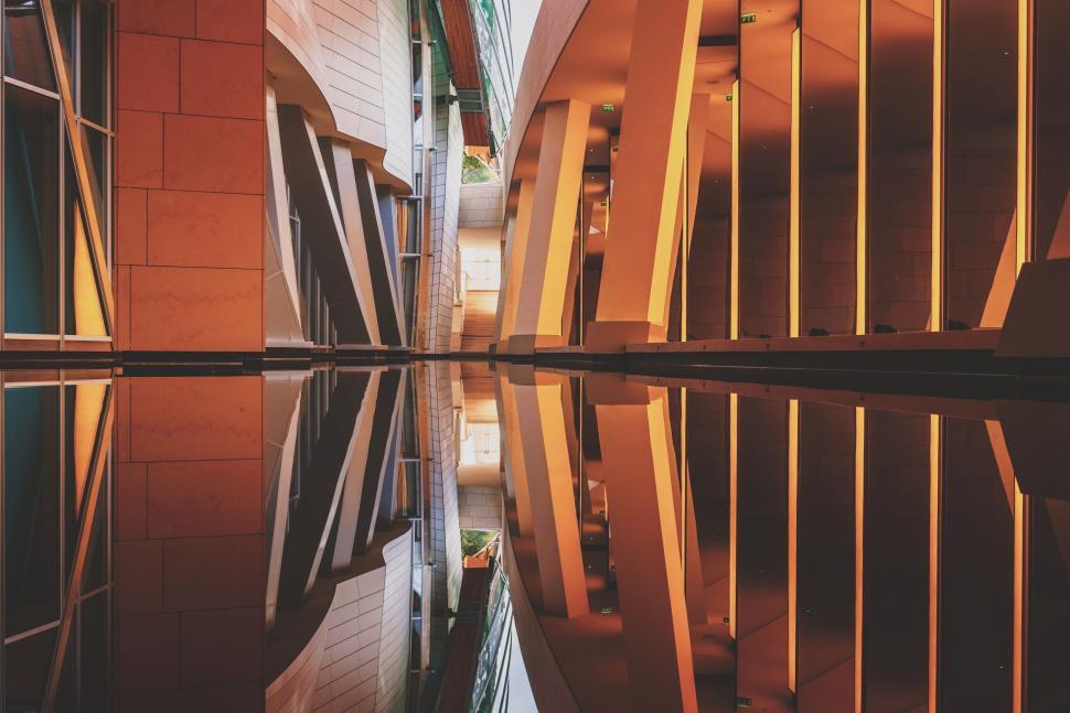 Free Image of Reflection of a Building in a Pool of Water 