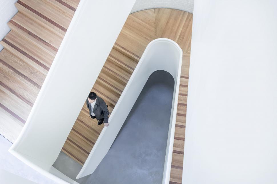 Free Image of Person Walking Down Staircase 