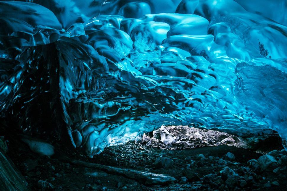 Free Image of Majestic Ice Cave Filled With Ice Formations 
