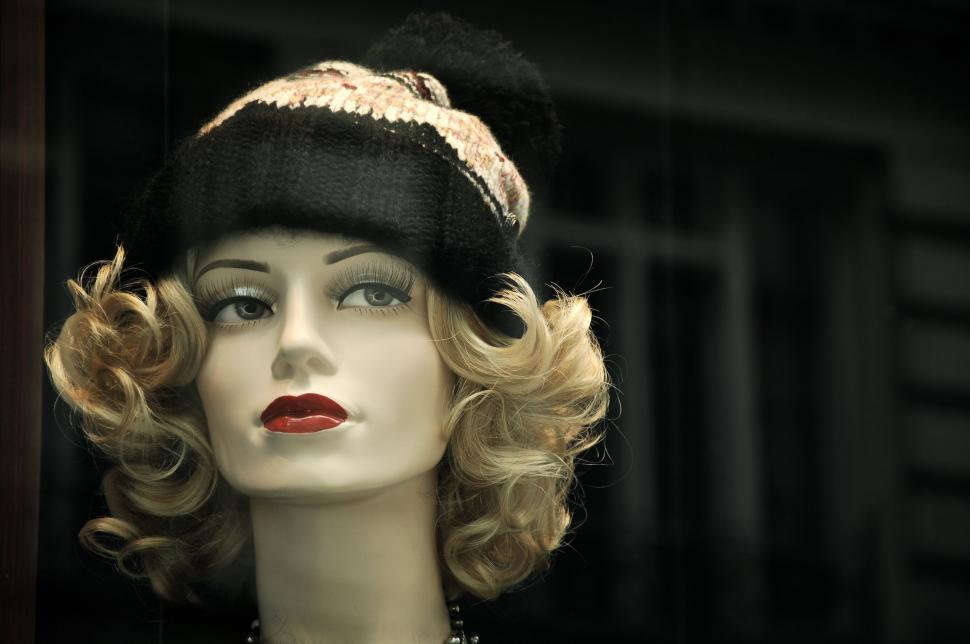 Free Image of Mannequin Wearing Hat and Necklace 