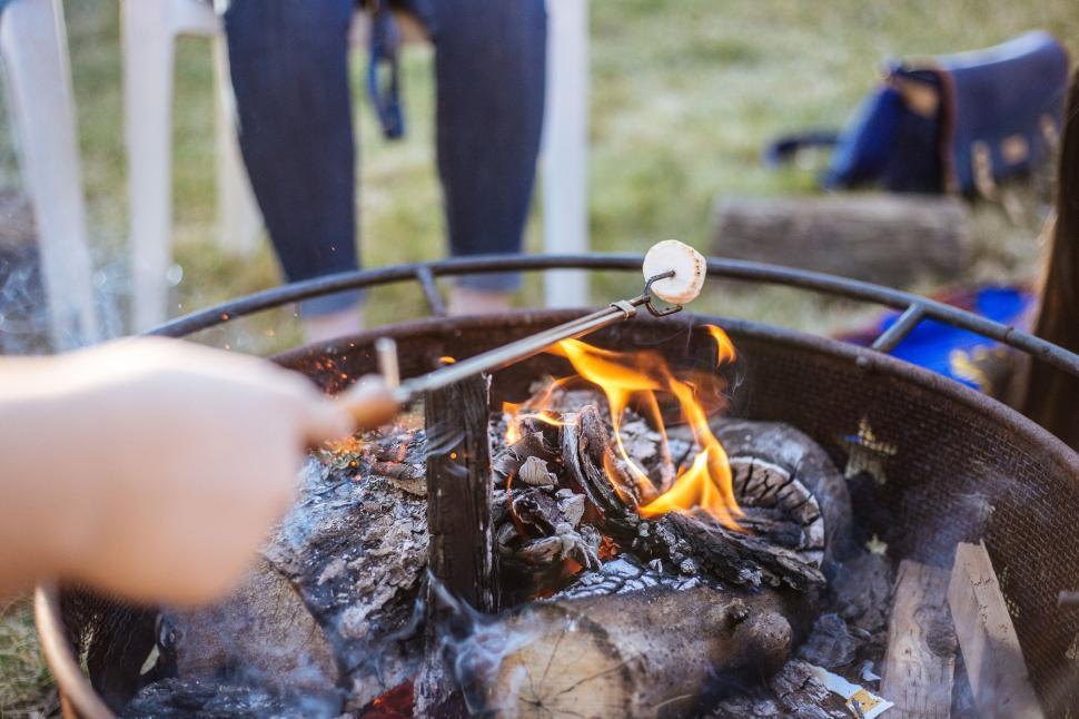 Free Image of Person Cooking Food Over an Open Fire 