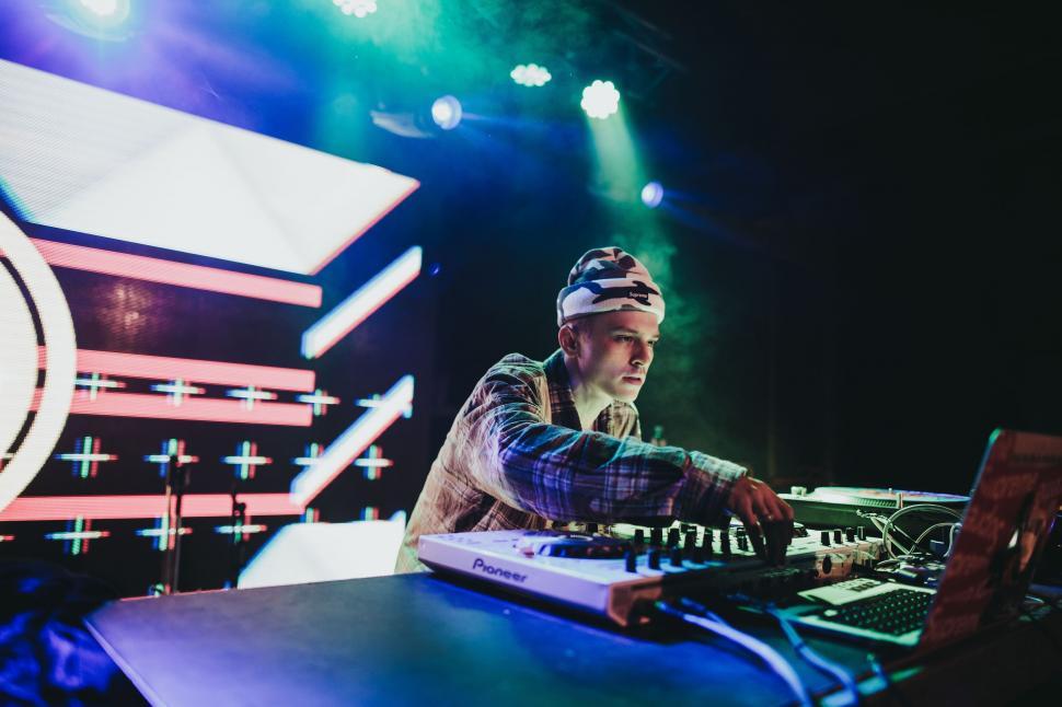 Free Image of DJ Mixing Music on Stage at Concert 