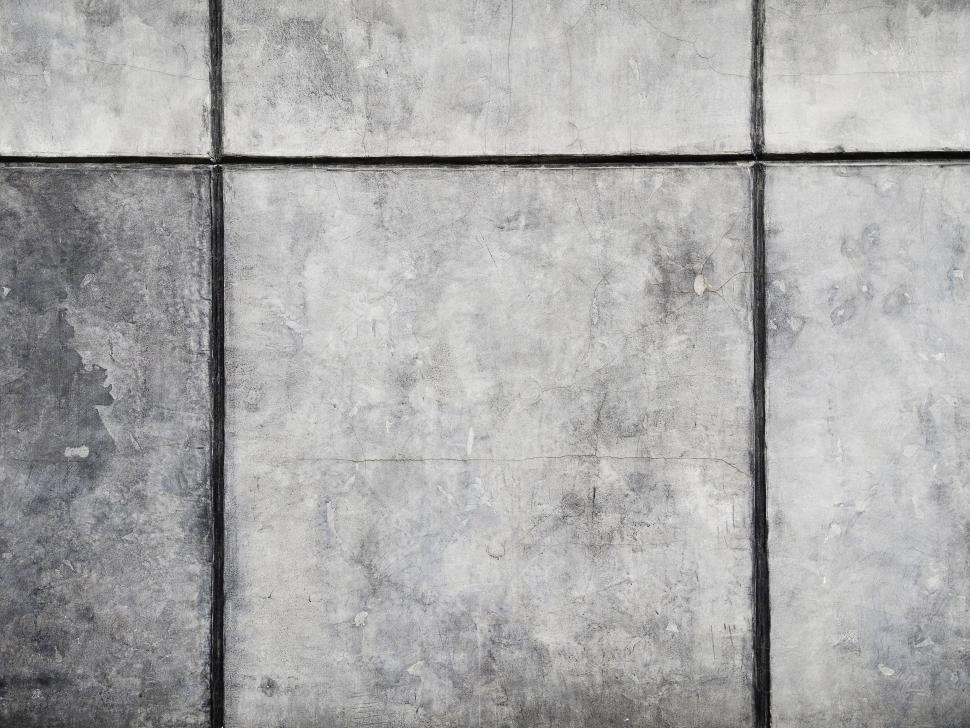 Free Image of A Black and White Photo of a Cement Wall 