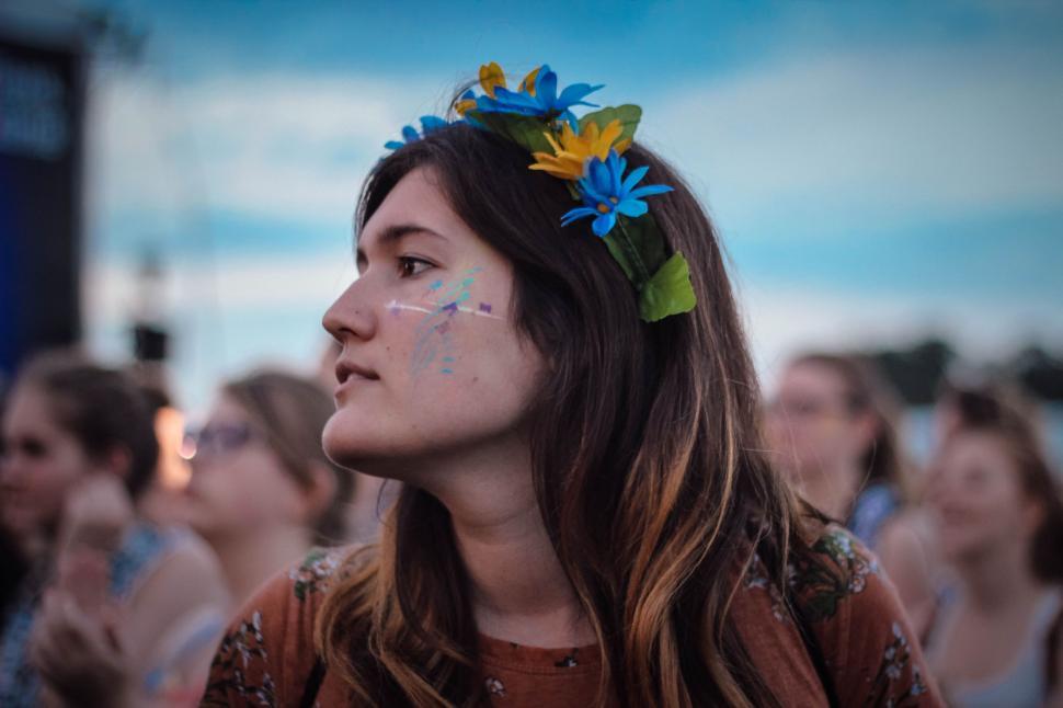 Free Image of Woman Adorned With Flower in Hair 