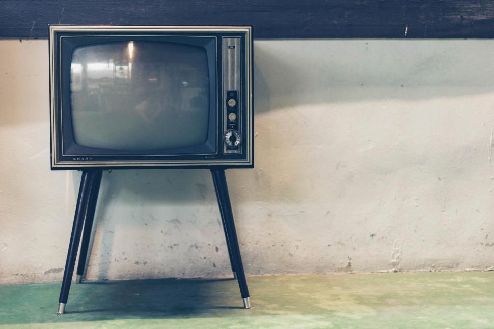 Free Image of Vintage TV on Wooden Stand 