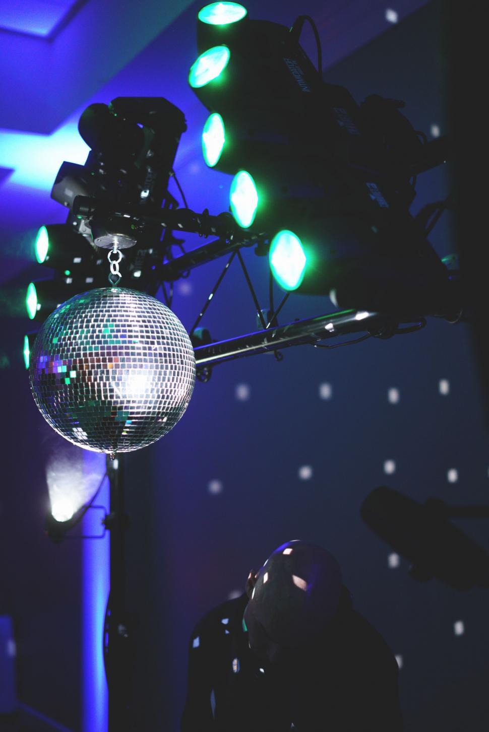 Free Image of Disco Ball Hanging in Dark Room 