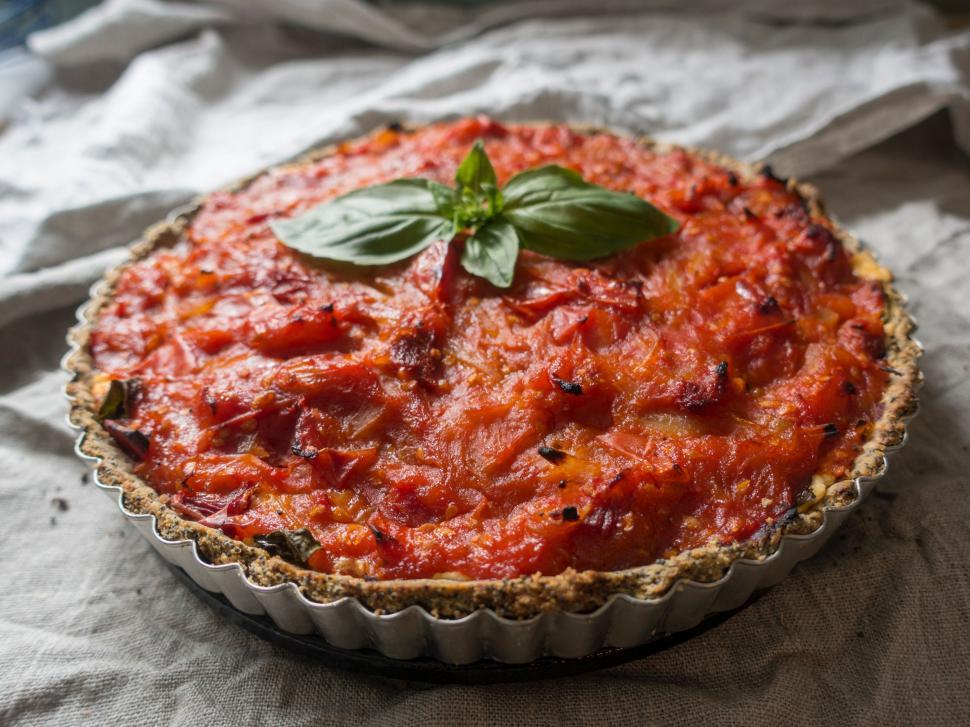Free Image of Tomato Pie With Leaf on Top 