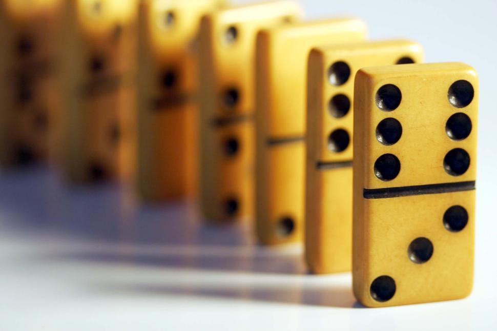 Free Image of Row of Yellow Dominoes Stacked 