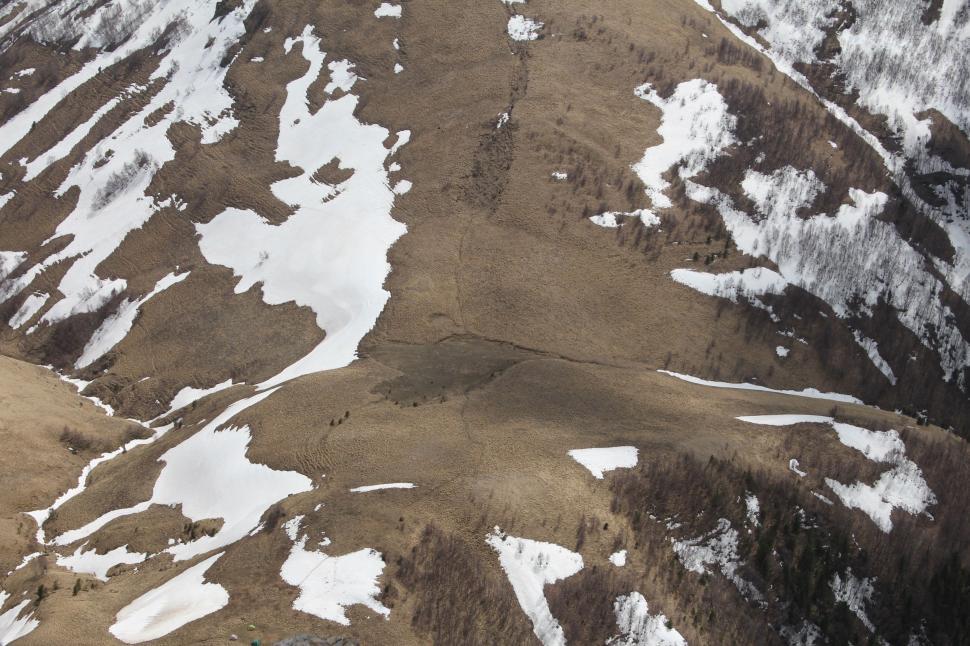 Free Image of Aerial View of Snow Covered Mountain 