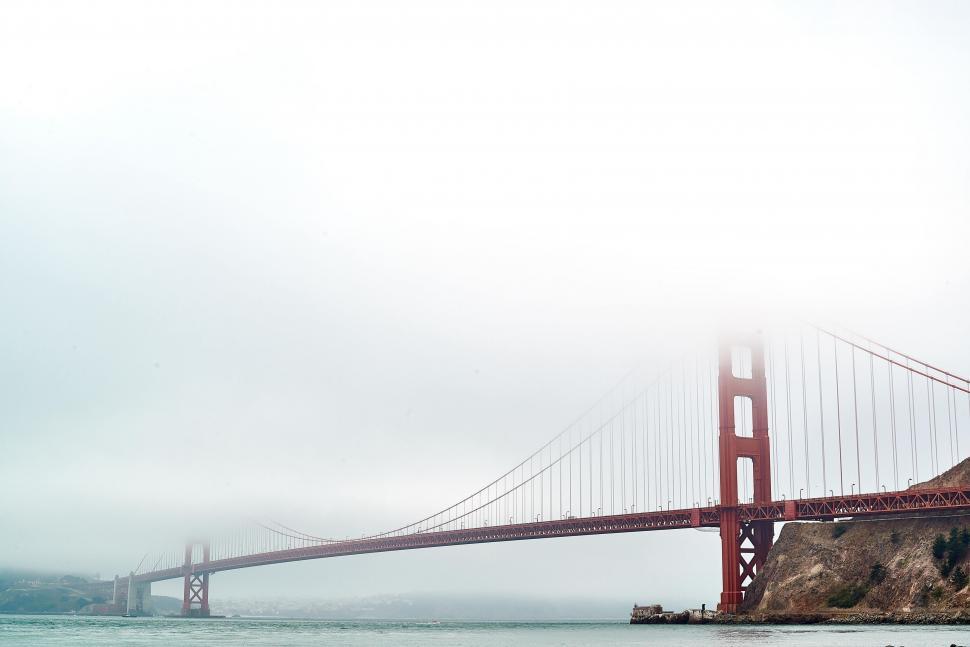 Free Image of The Golden Gate Bridge Shrouded in Fog 