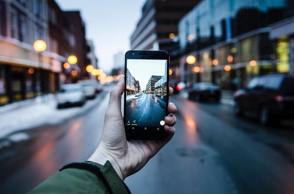 Free Image of Person Taking Picture of Street With Cell Phone 