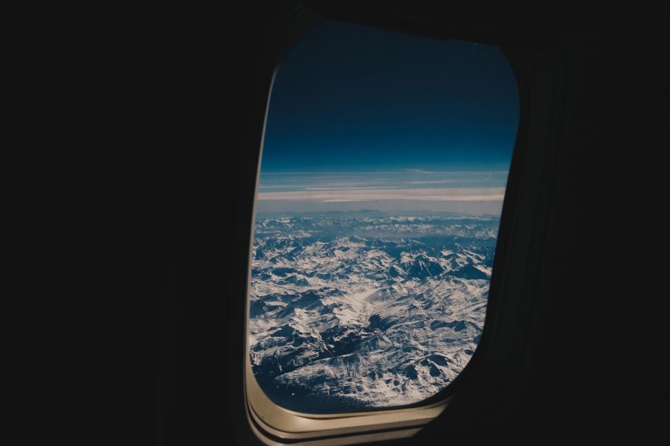 Free Image of Mountain View From Airplane Window 