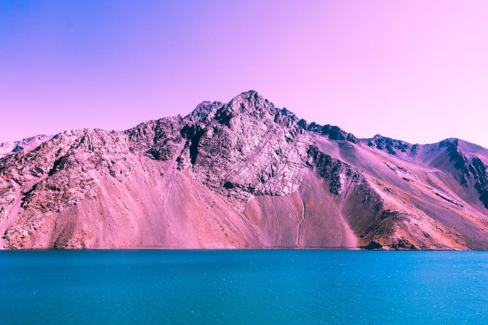 Free Image of Majestic Mountain Overlooking Body of Water 