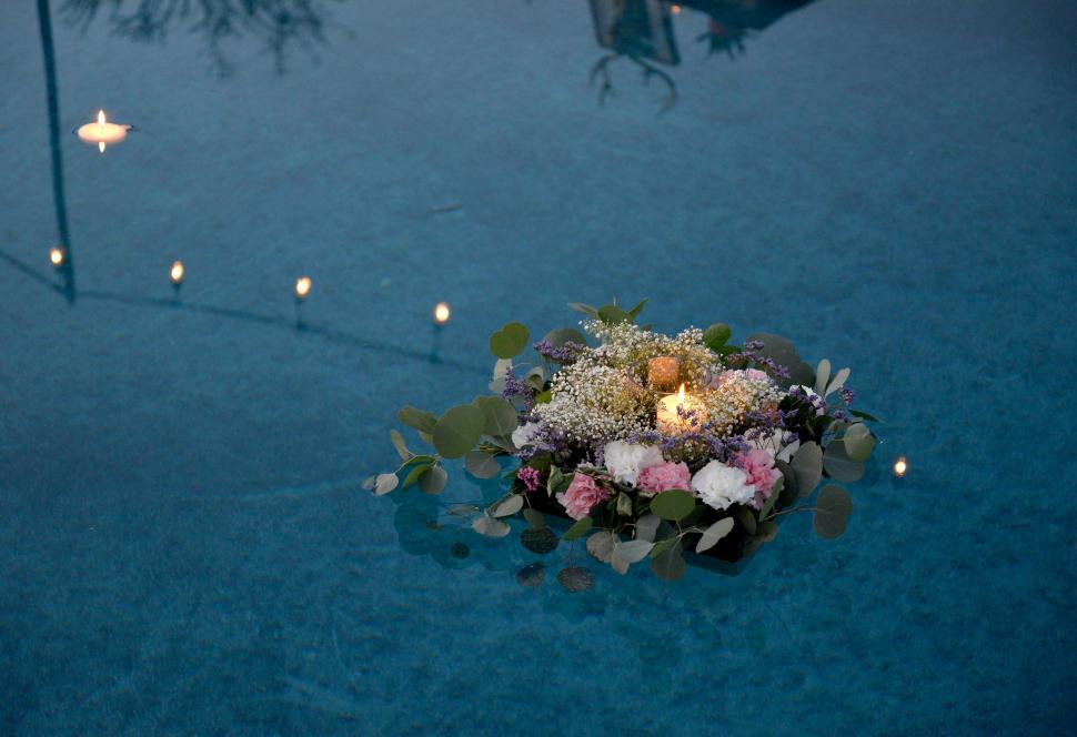 Free Image of Bouquet of Flowers on Pool 