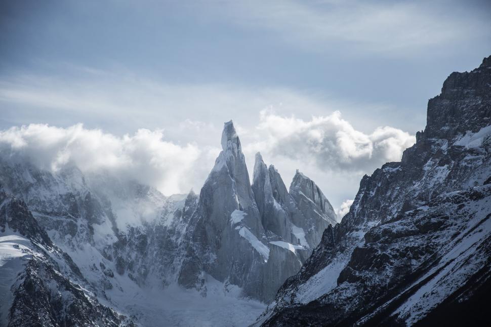 Free Image of Majestic Mountain Peak With Clouds 