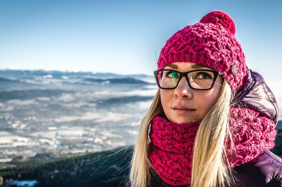 Free Image of Woman Wearing Pink Hat and Scarf 