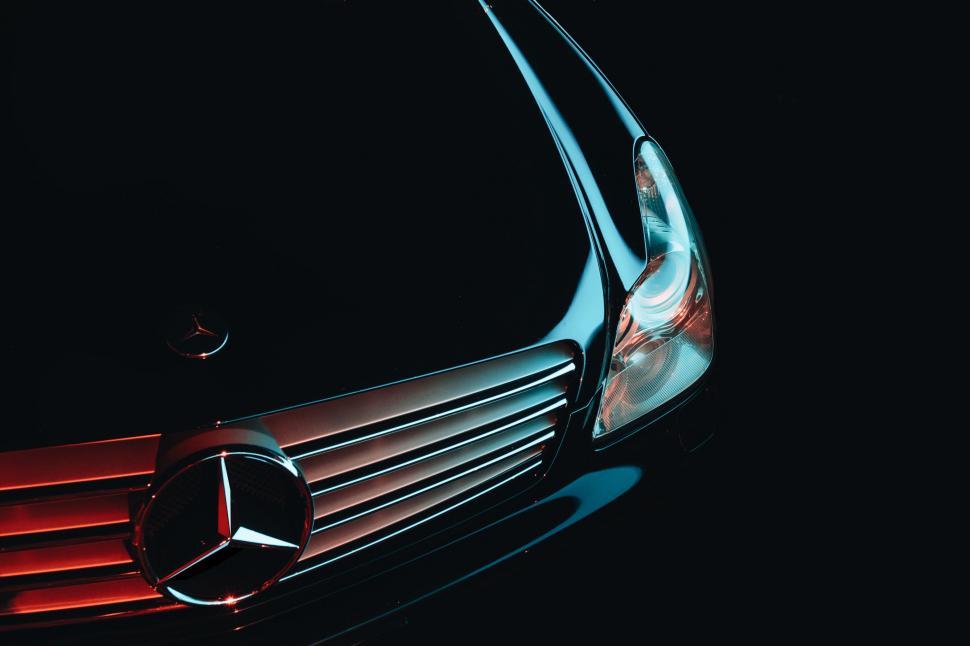 Free Image of Close Up of Mercedes Logo on Car 
