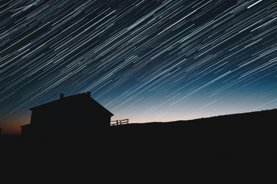 Free Image of Night Sky With House and Stars 