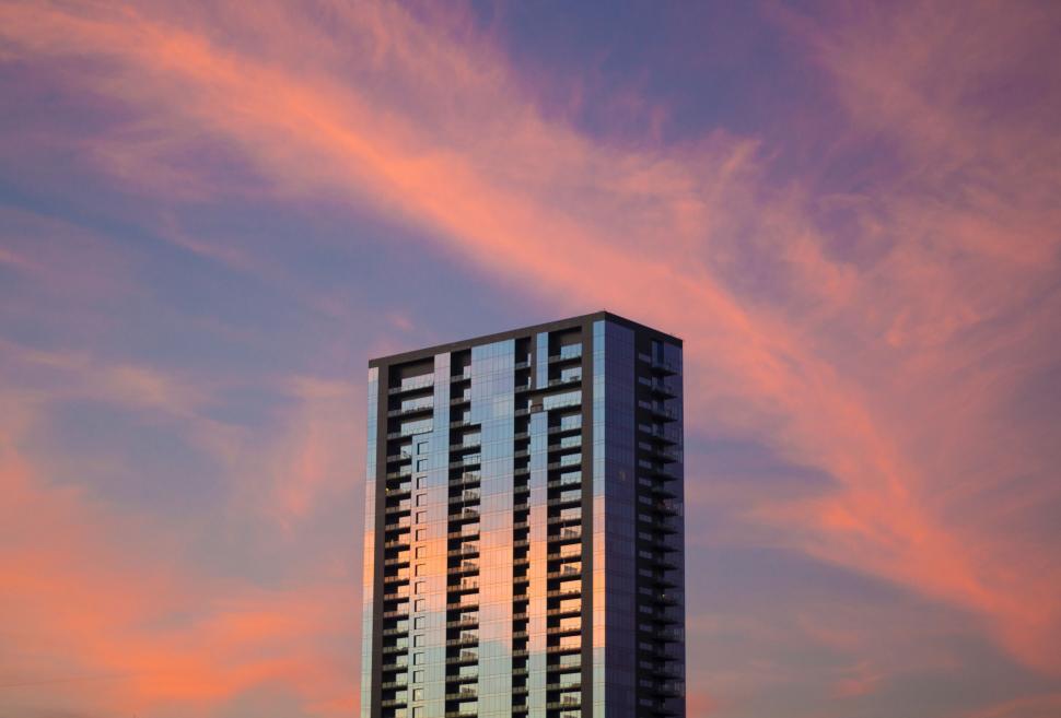 Free Image of Tall Building Against Skyline 