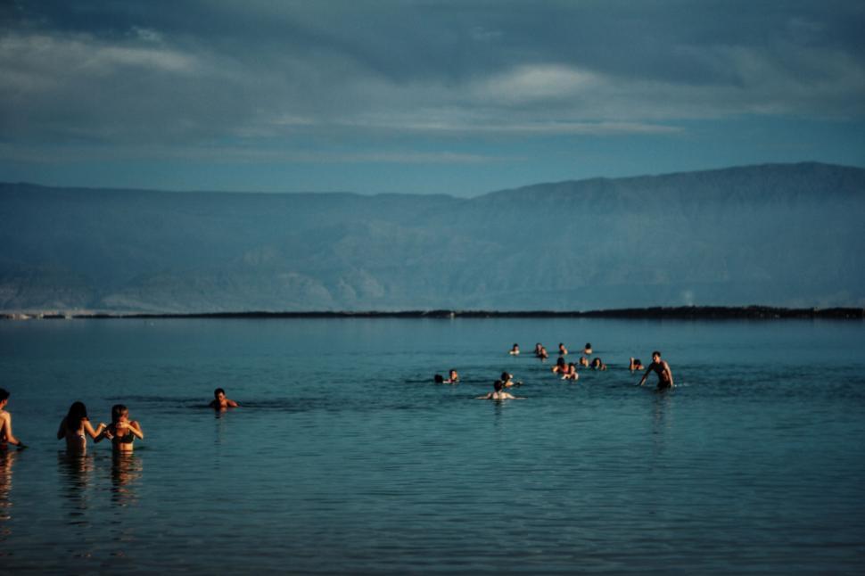 Free Image of Group of People Swimming in a Lake 