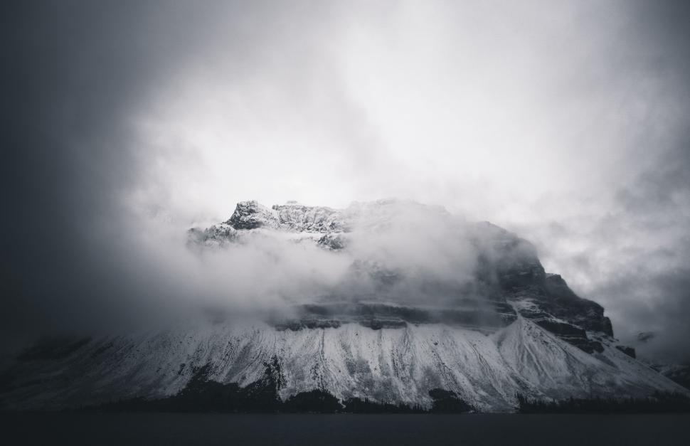 Free Image of Mountain Covered in Clouds 