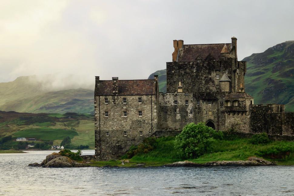 Free Image of Castle Perched on Small Island in Middle of Lake 