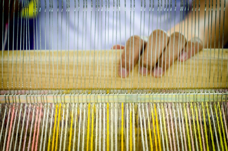 Free Image of Dresses making on loom 