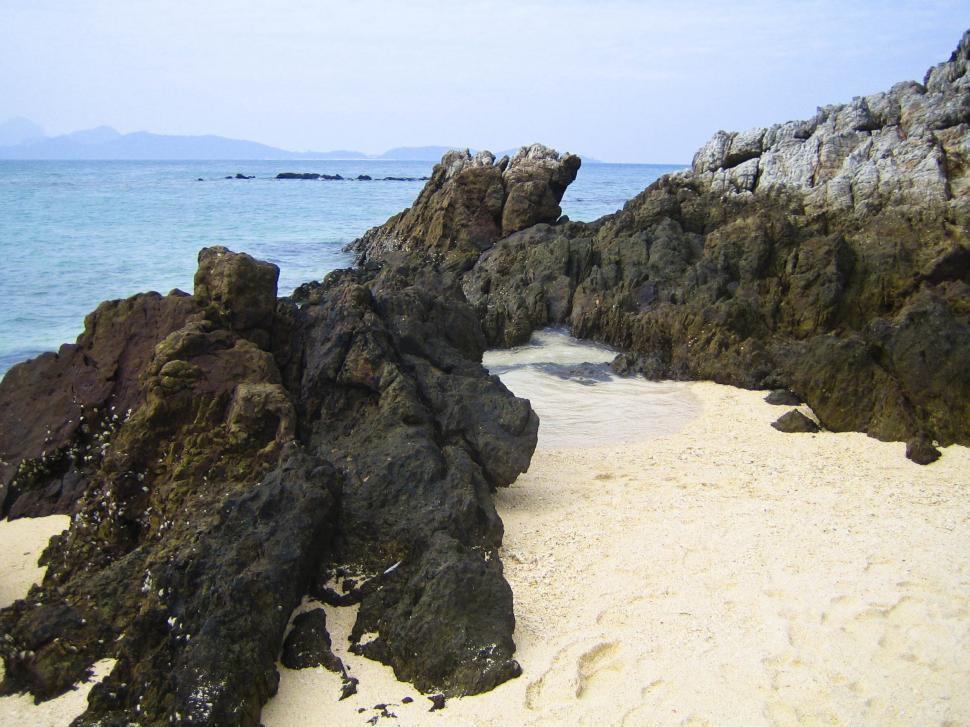 Free Image of rock and sand beach 