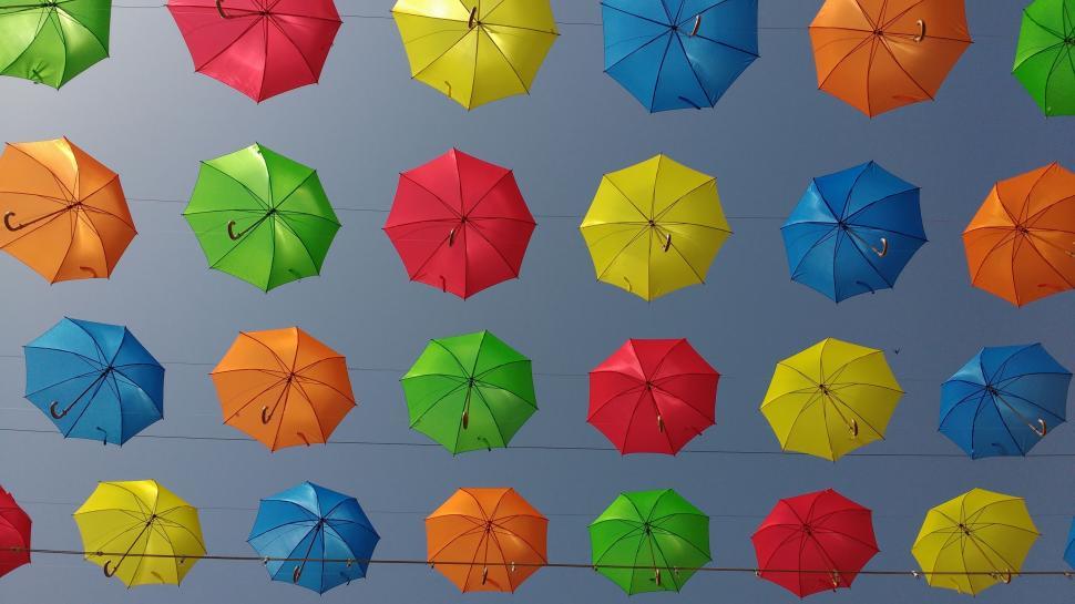 Free Image of Colorful Umbrellas Hanging From a Line 