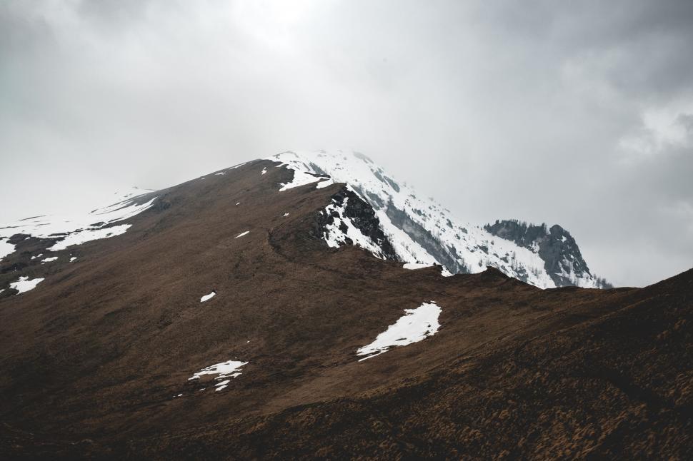 Free Image of Towering Snow-Covered Mountain Peak 
