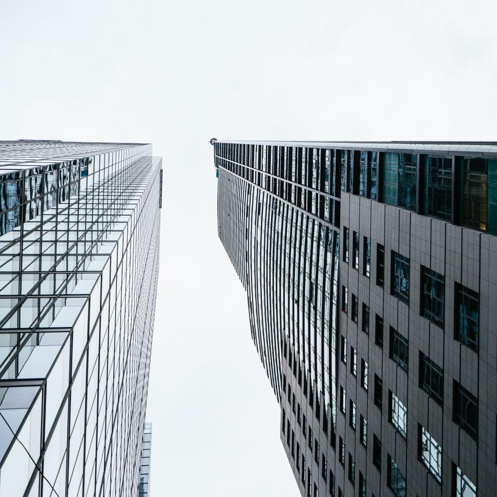 Free Image of Two Tall Buildings Standing Side by Side 