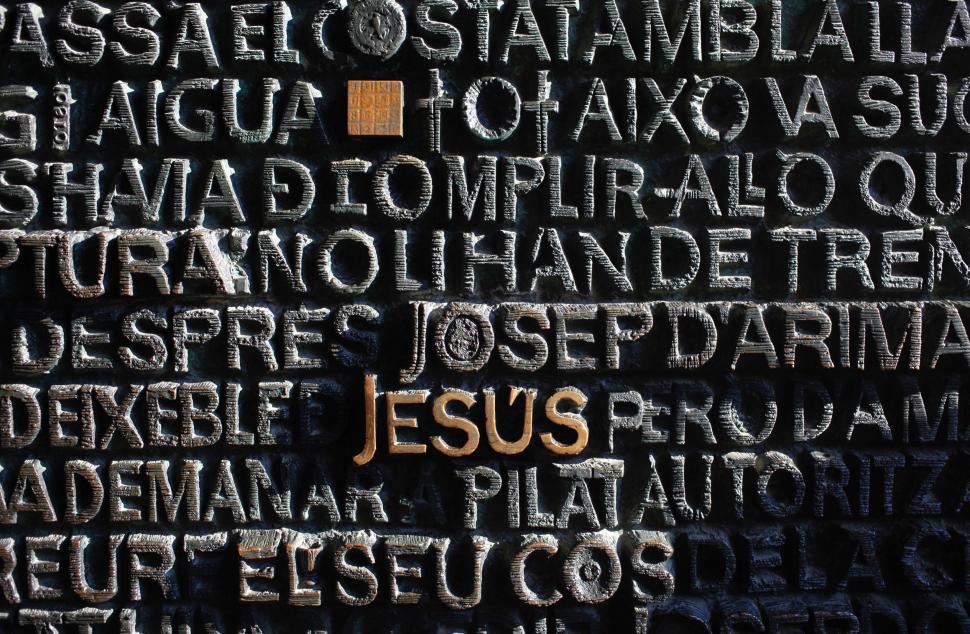 Free Image of The Word Jesus Written on the Side of a Building 