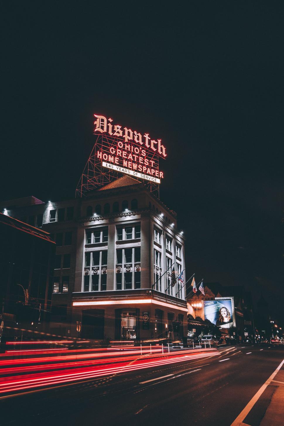 Free Image of Large Building With Neon Sign 
