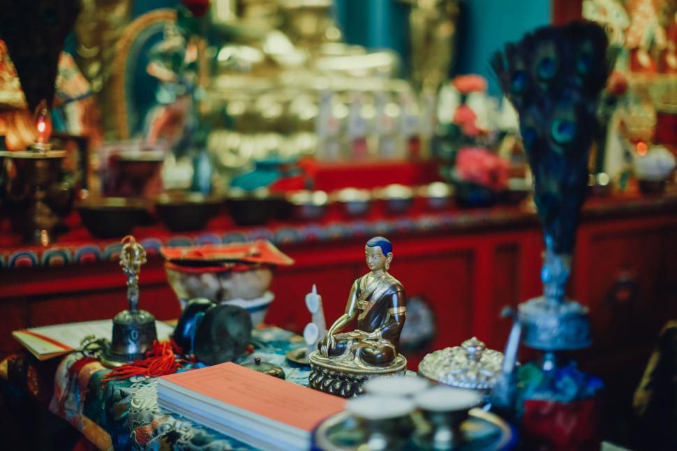 Free Image of Small Buddha Statue on Table 