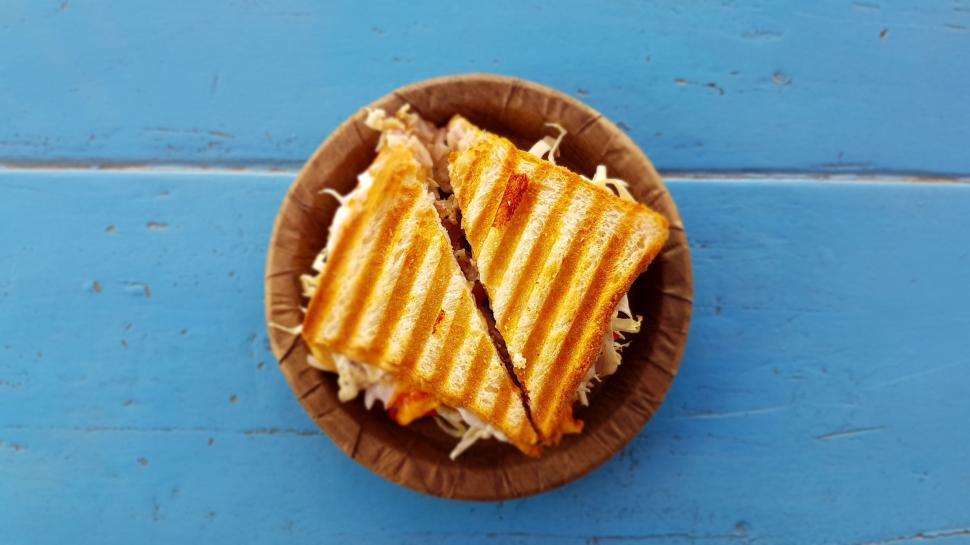 Free Image of Brown Paper Plate With Half Sandwich 