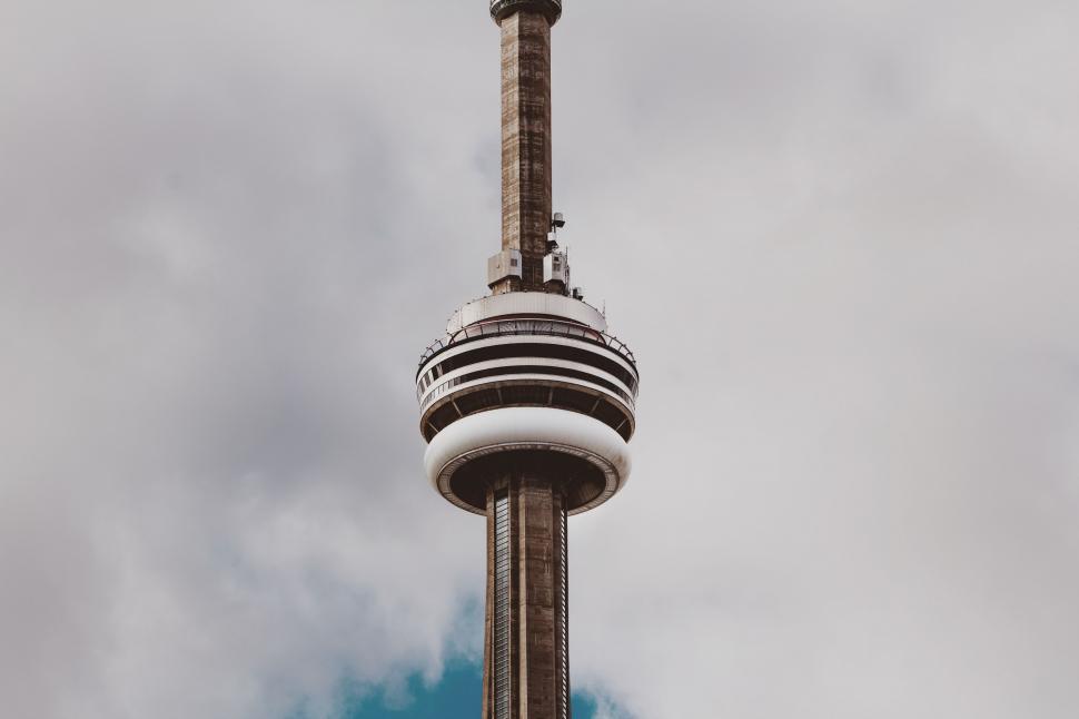 Free Image of Tower With Clock Leaning Sideways 
