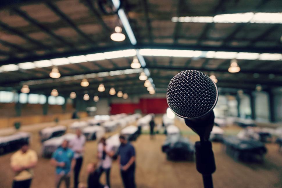 Free Image of Microphone in Front of a Group of People 