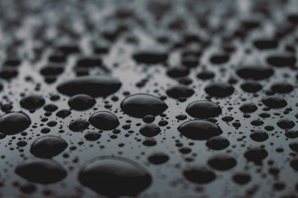 Free Image of Close Up of Water Droplets on Surface 