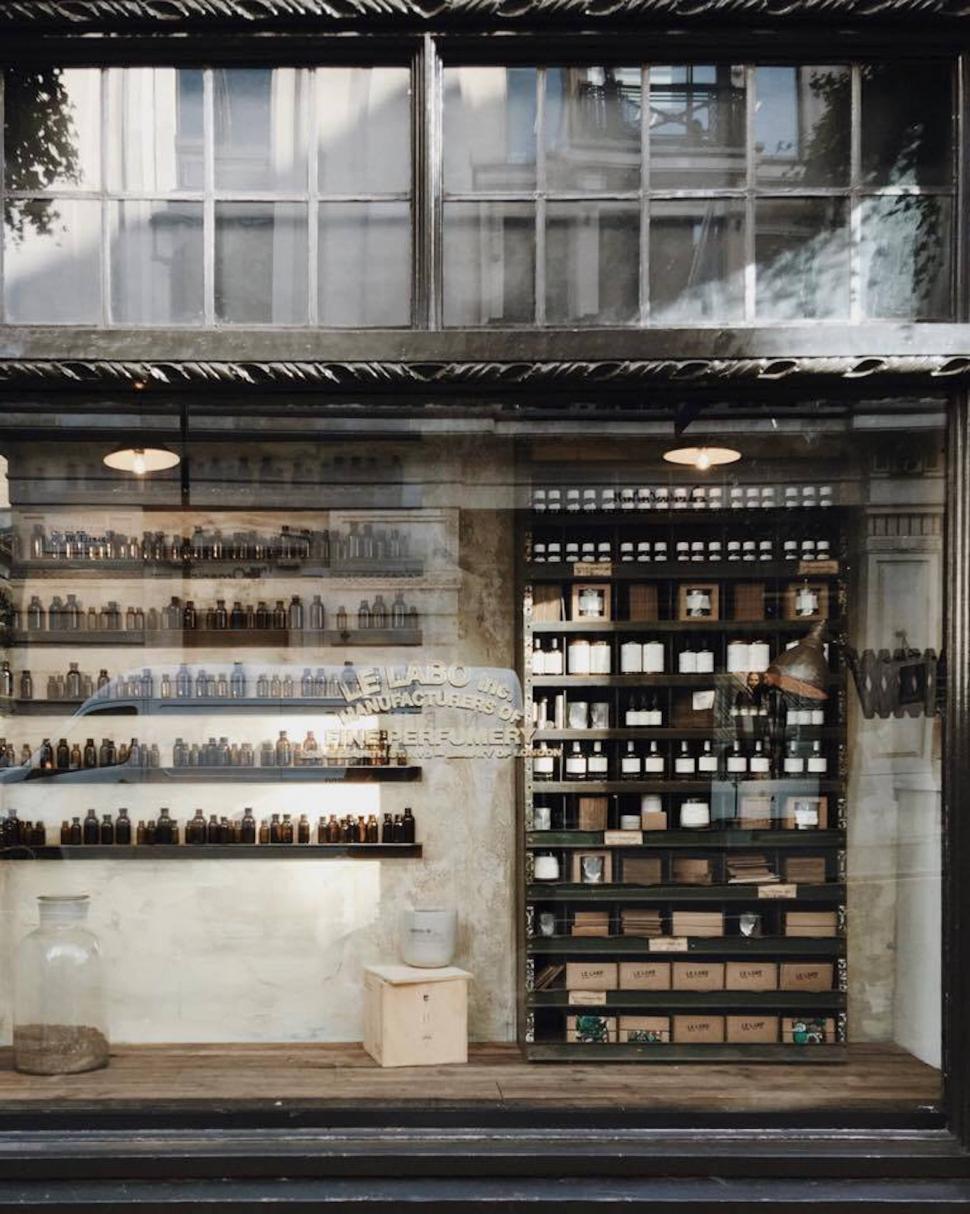 Free Image of Store Front Adorned With Numerous Bottles 