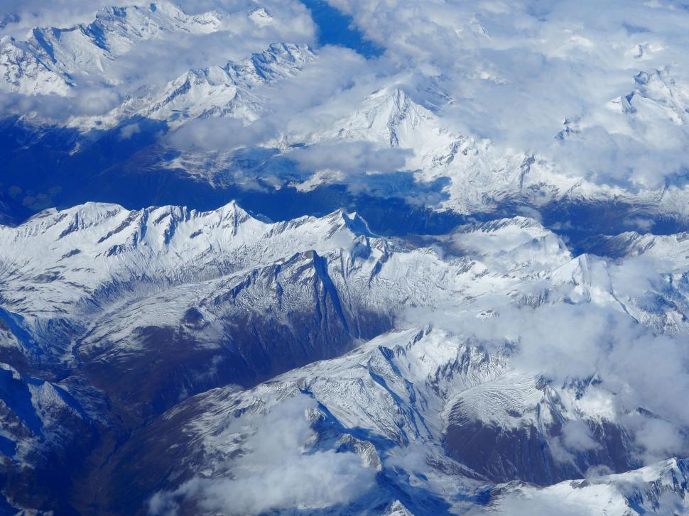 Free Image of Aerial View of Mountain Range From Airplane 