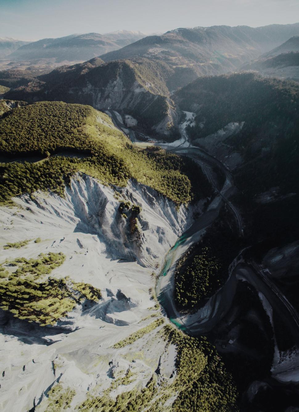 Free Image of Aerial View of Snow Covered Mountain Range 