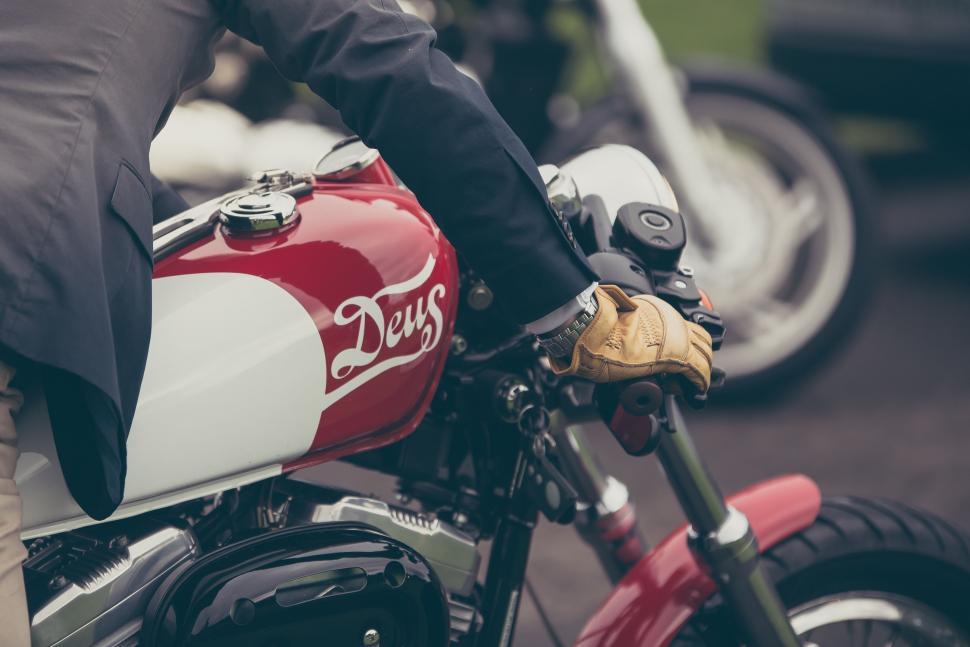 Free Image of Close Up of a Red and White Motorcycle 