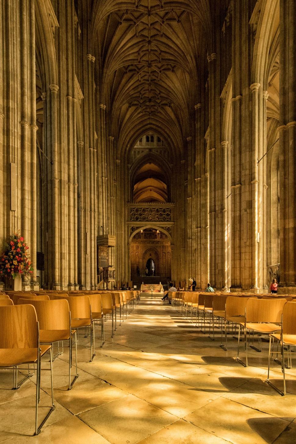 Free Image of Cathedral Filled With Brown Chairs 